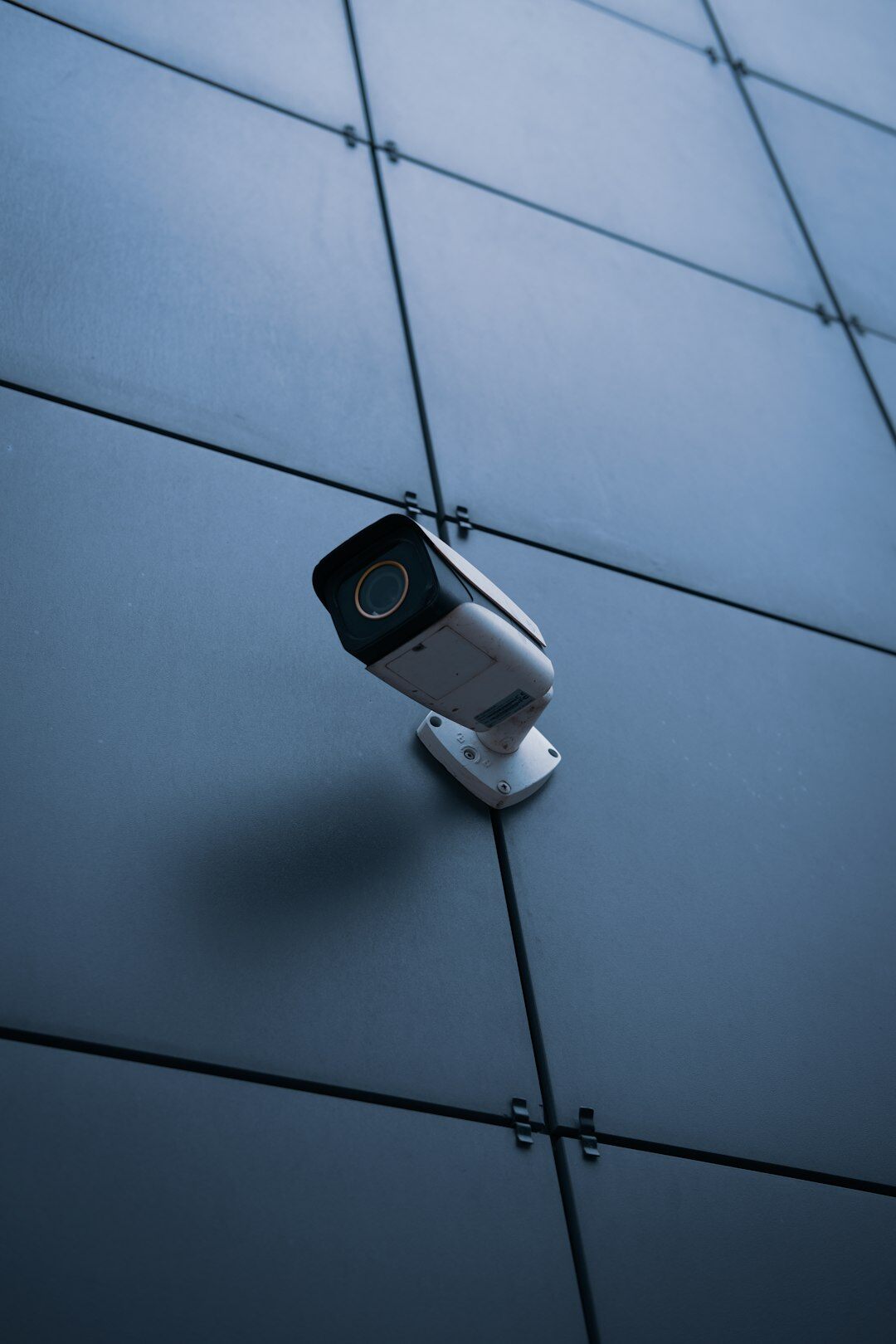 store security guard monitoring cameras