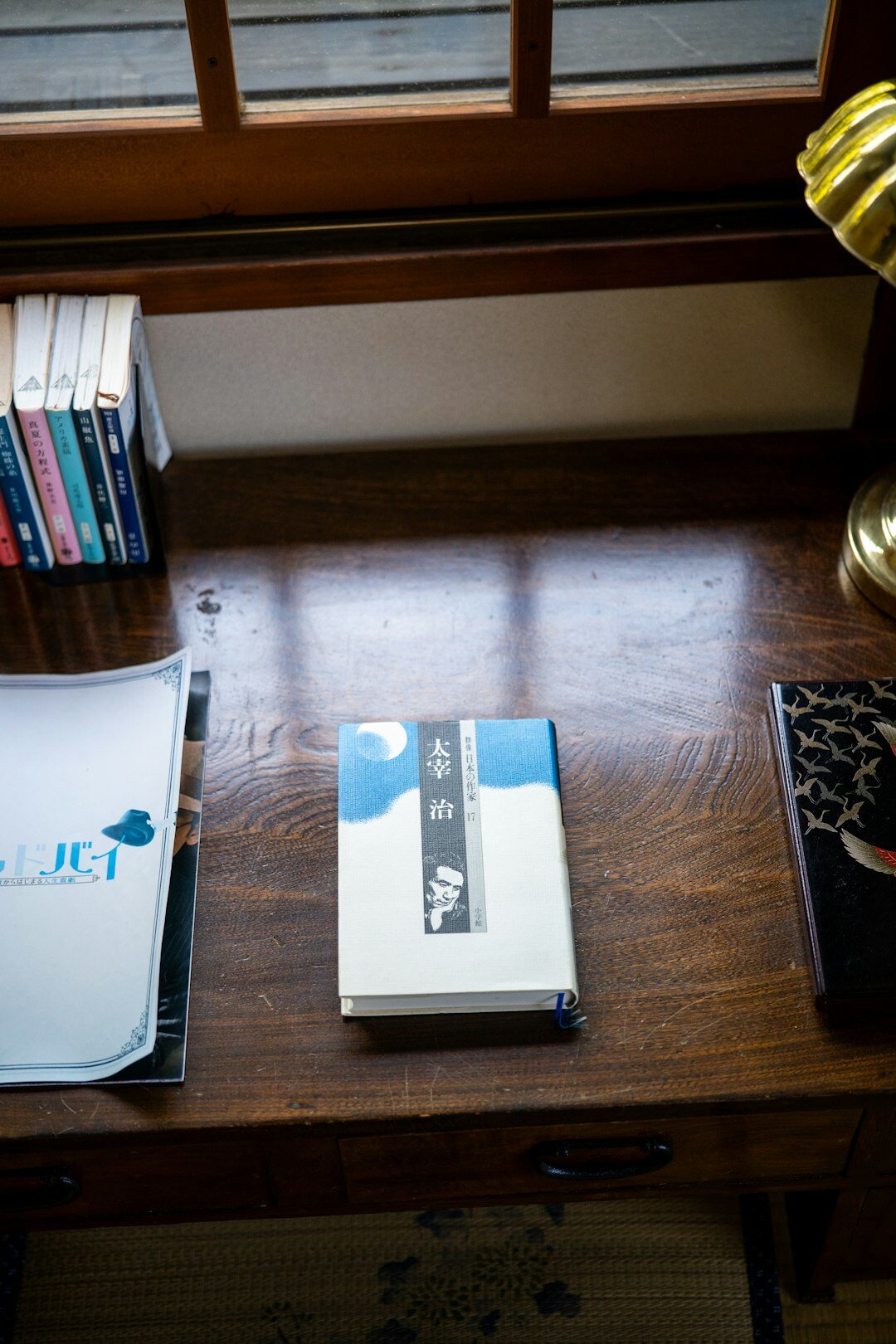 Investigator desk with case files and a coffee cup